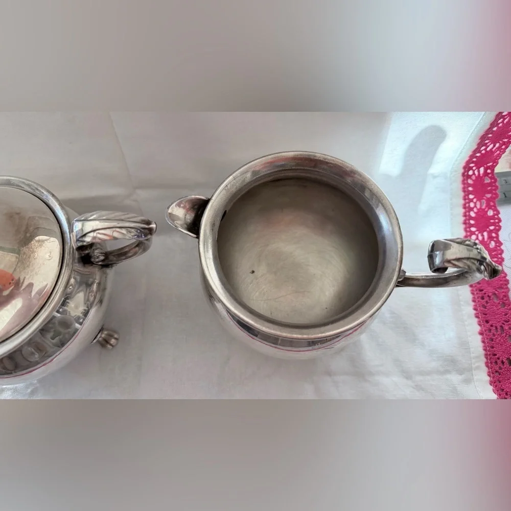 vintage EPCA Bristol by Poole ornate silver-plated sugar bowl and a creamer.